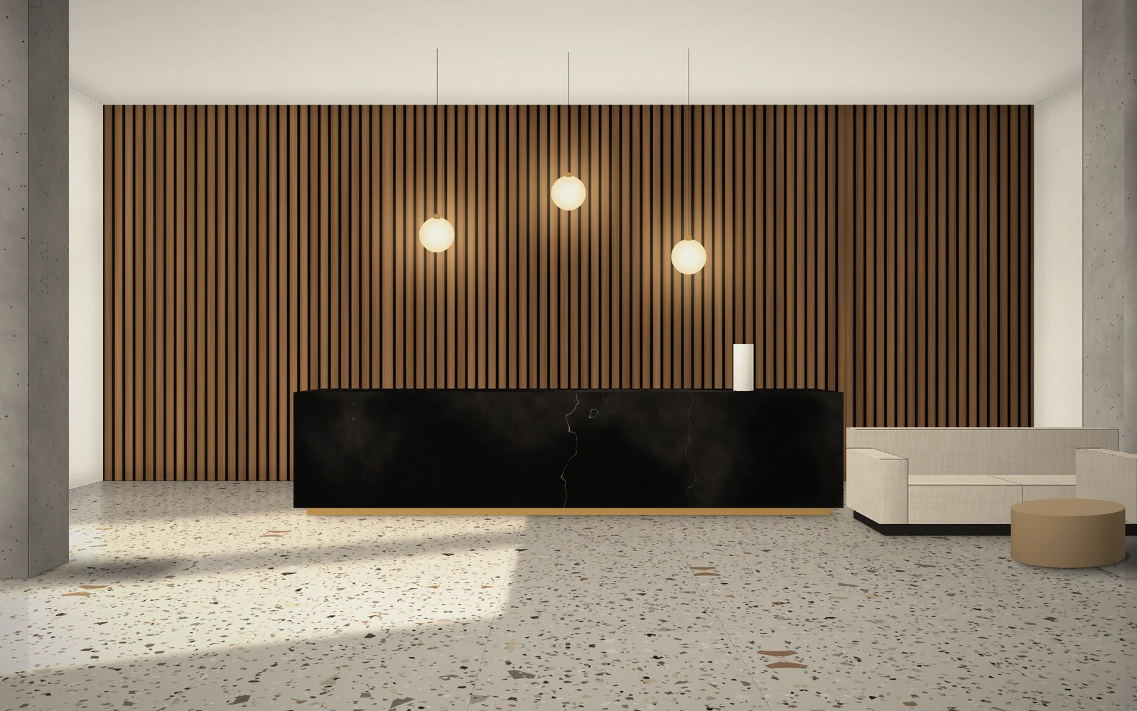 Hotelski lobby sa podom u terazzu i pultom od crnog mermera